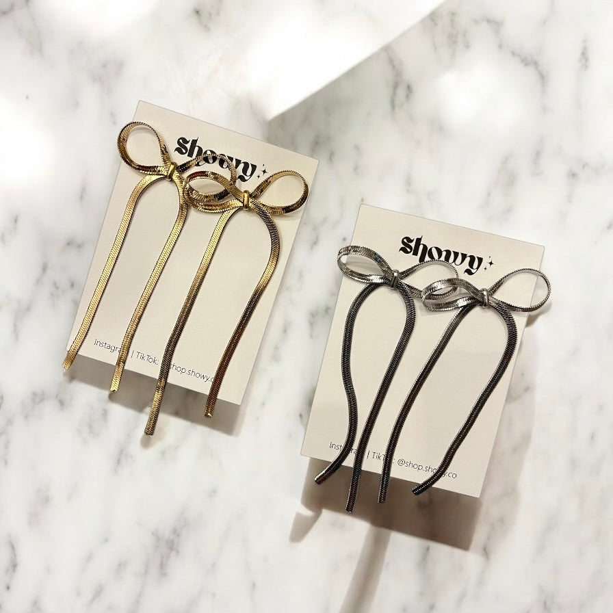 Long bow earrings