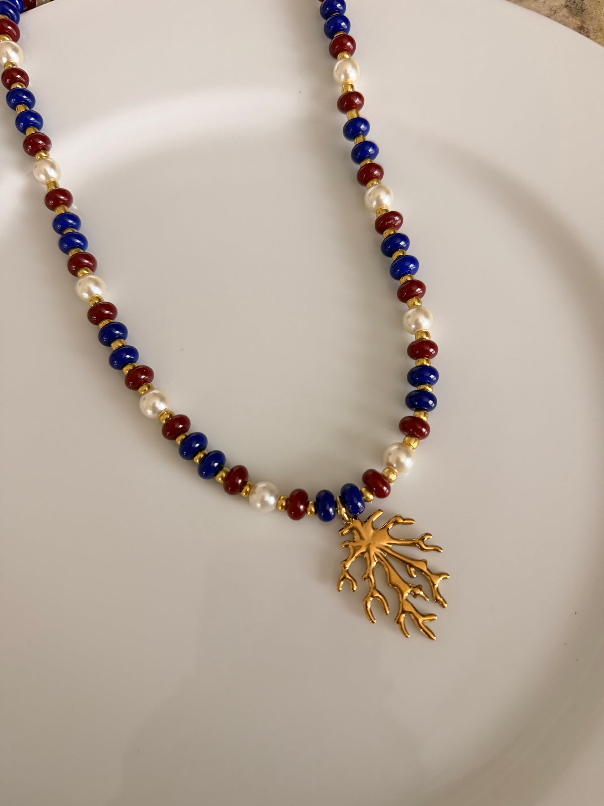 Vibrant multicolored glass beaded necklace for women, perfect for a coastal girl summer beach aesthetic.
