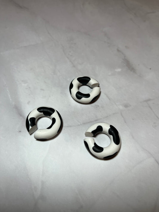 Cow print earcuffs