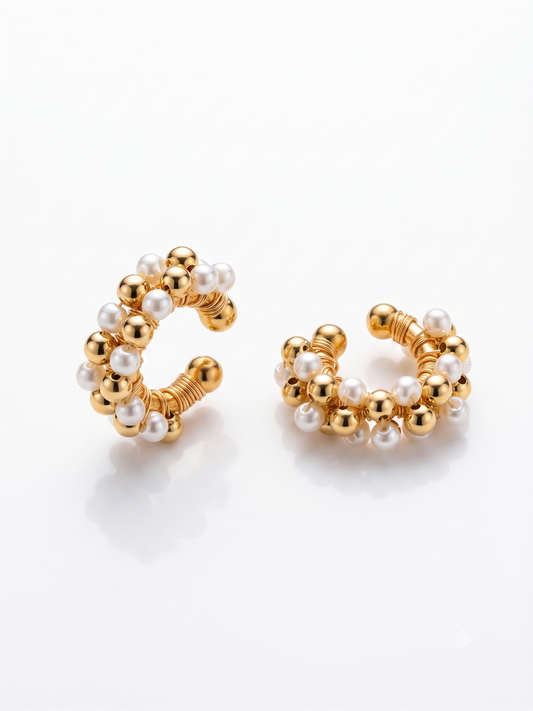 an image showcasing a pair of beaded earcuffs from Showy LLC
